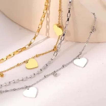 bracelet deux chaines avec coeur
