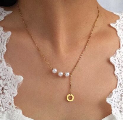 collier en forme de Y avec cercle et perles